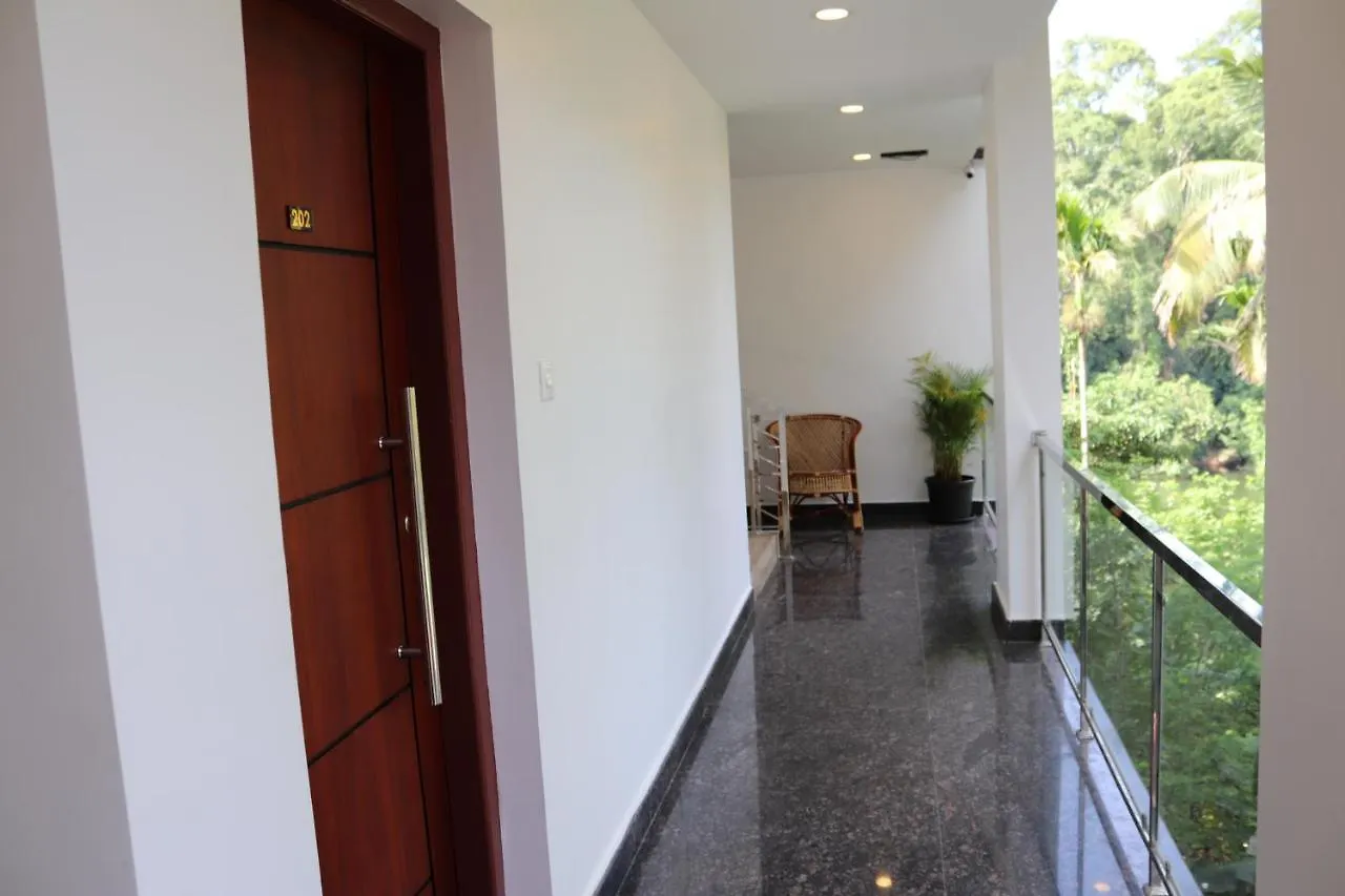 Thenmala Hormuz Inn Kolattupuzha
